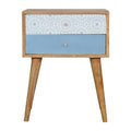 Table de chevet bleu à motifs