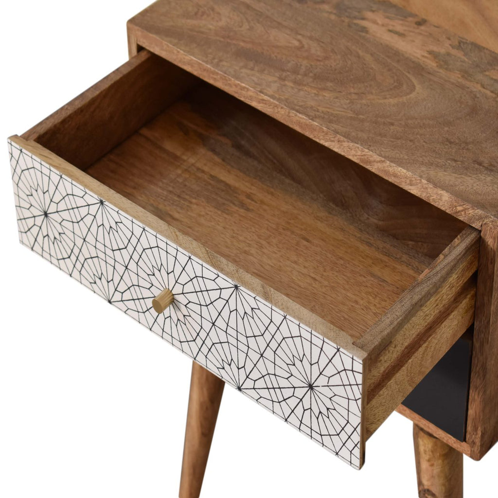 Table de chevet noir à motifs