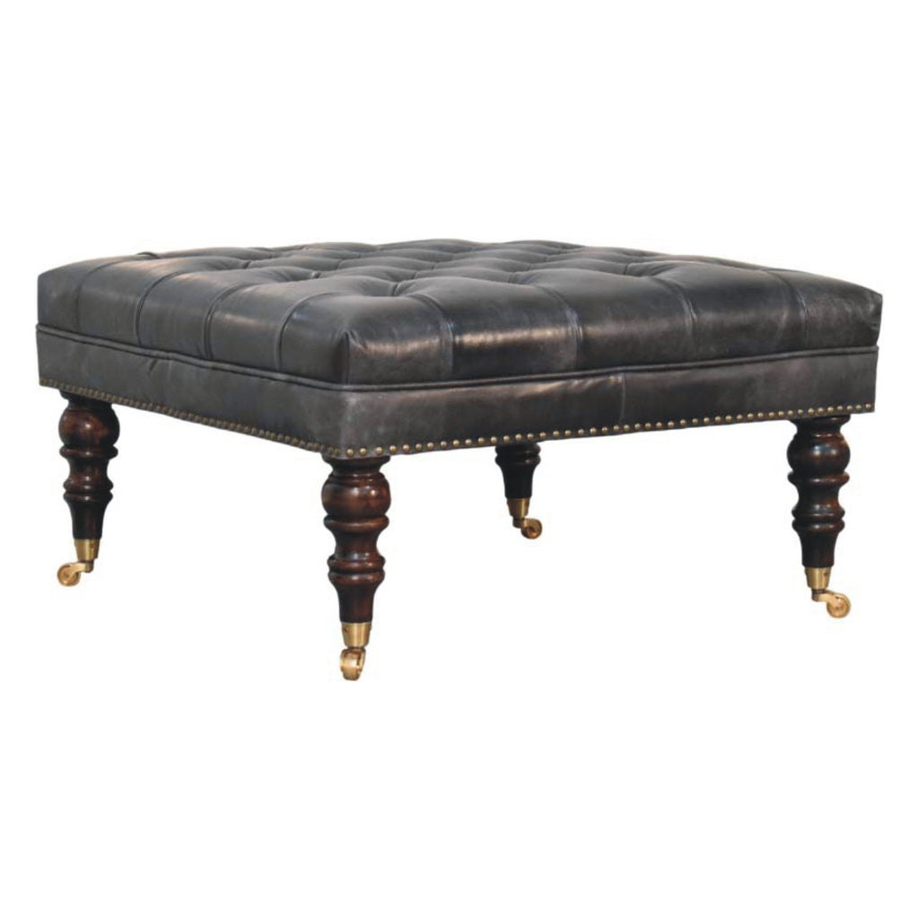 Pouf noir cuir tapissé