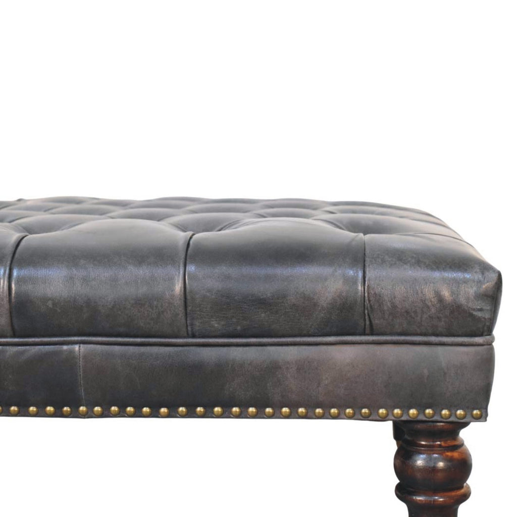 Pouf noir cuir tapissé