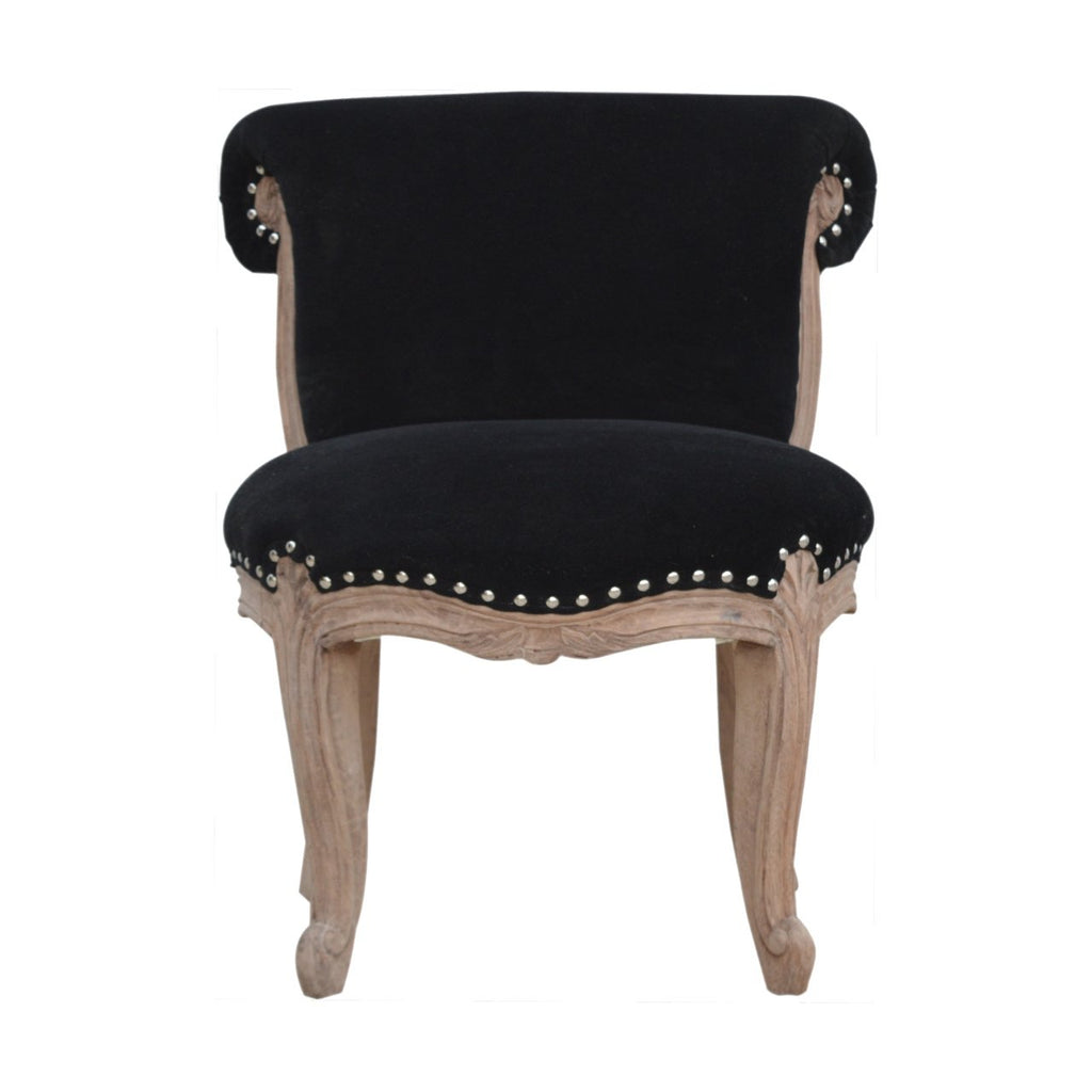 Chaise noir velours clouté