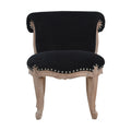 Chaise noir velours clouté