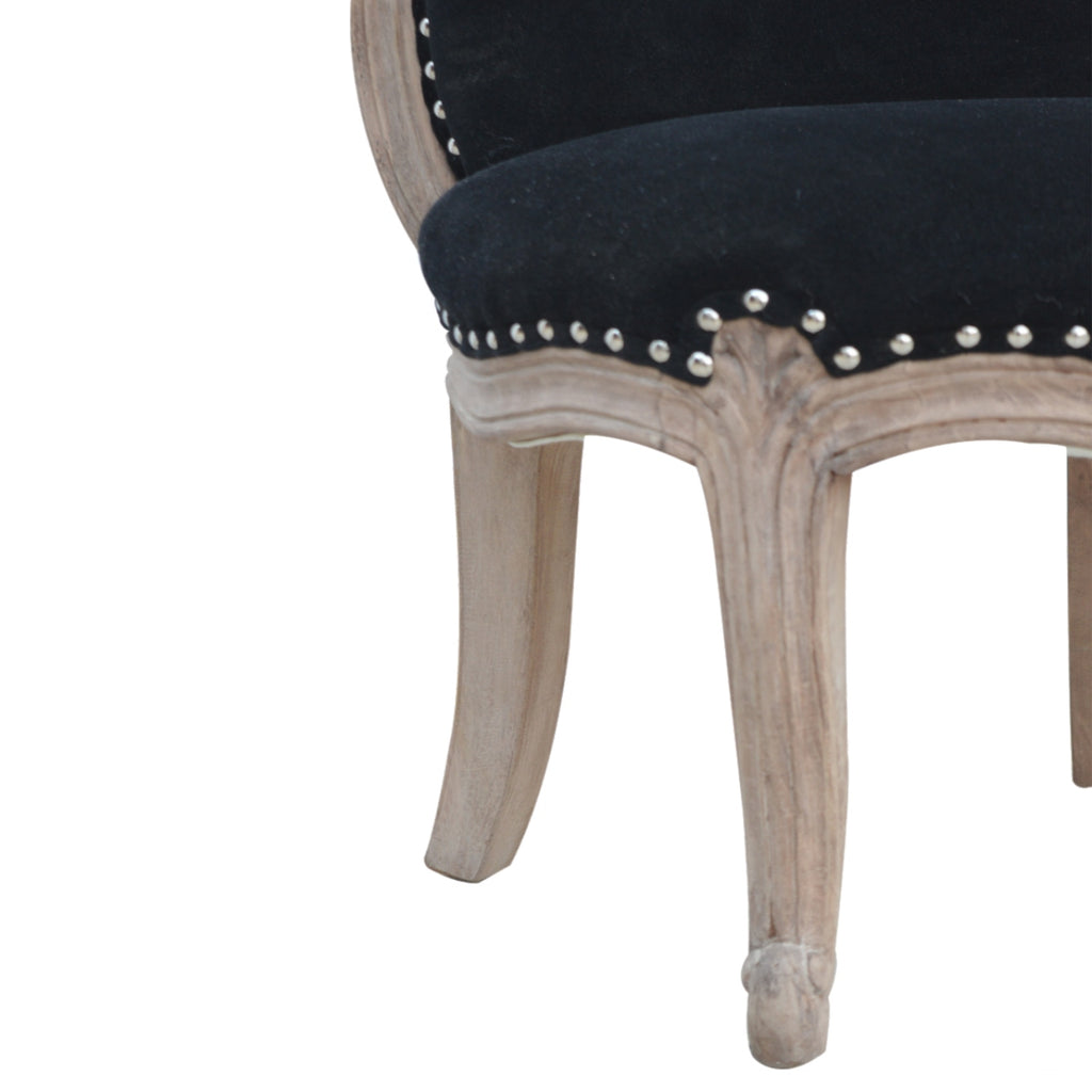 Chaise noir velours clouté