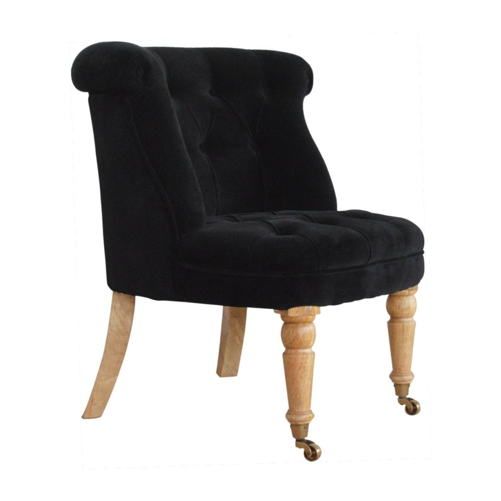 Fauteuil noir velours