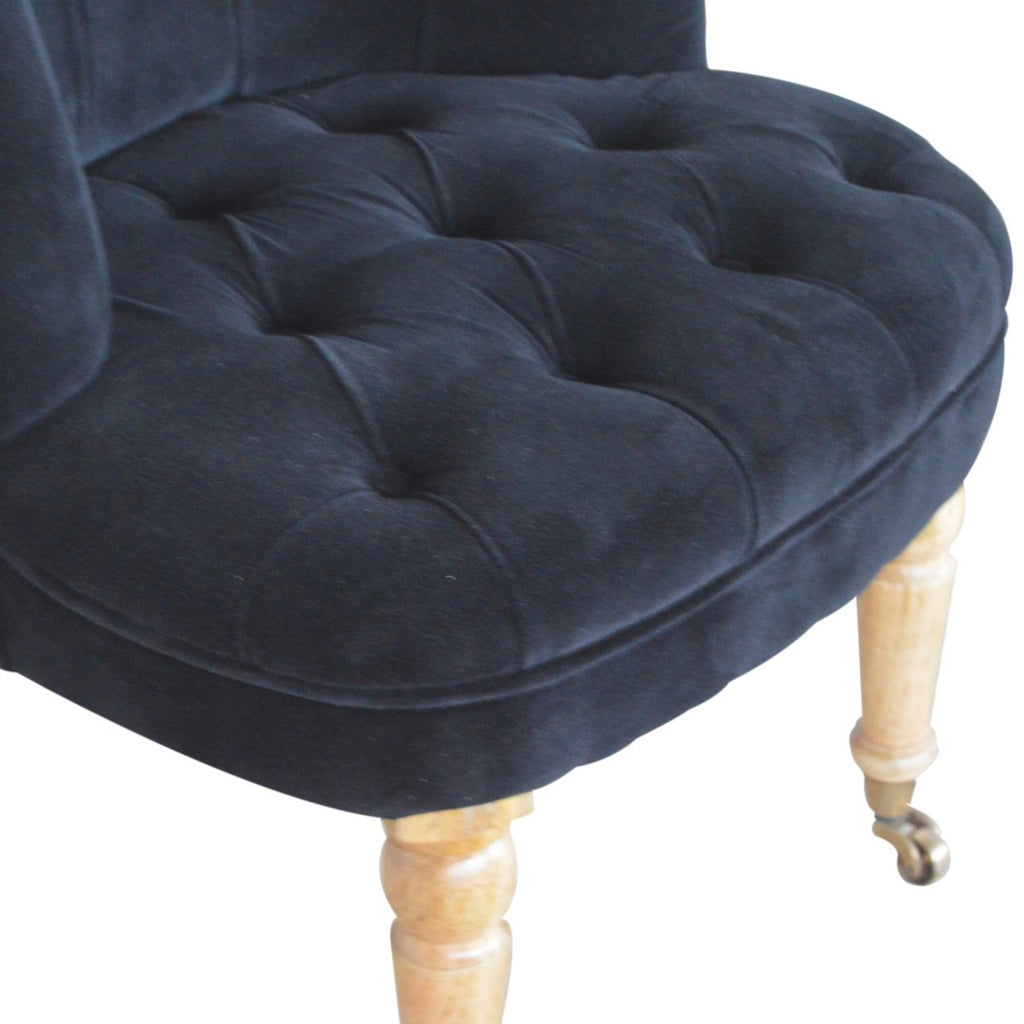 Fauteuil noir velours