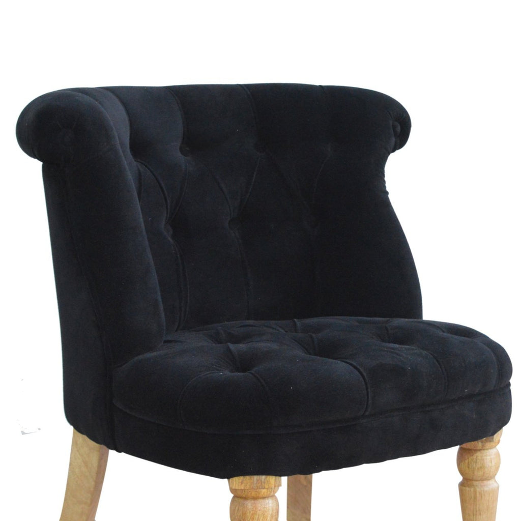 Fauteuil noir velours