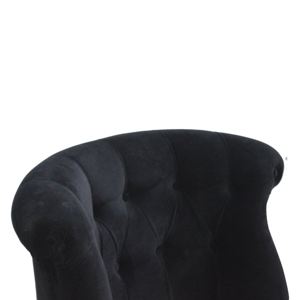 Fauteuil noir velours